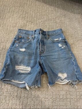 Levi’s Distressed Light Blue Denim Shorts